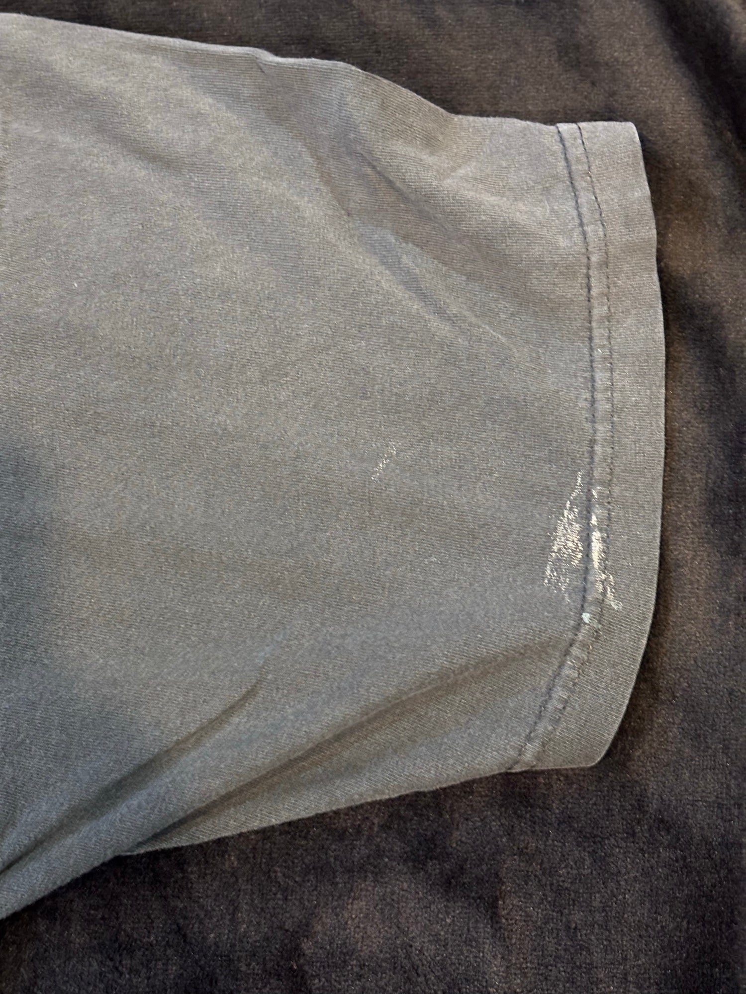 Biggie tee sleeve hem showing small bleach fleck for full disclosure