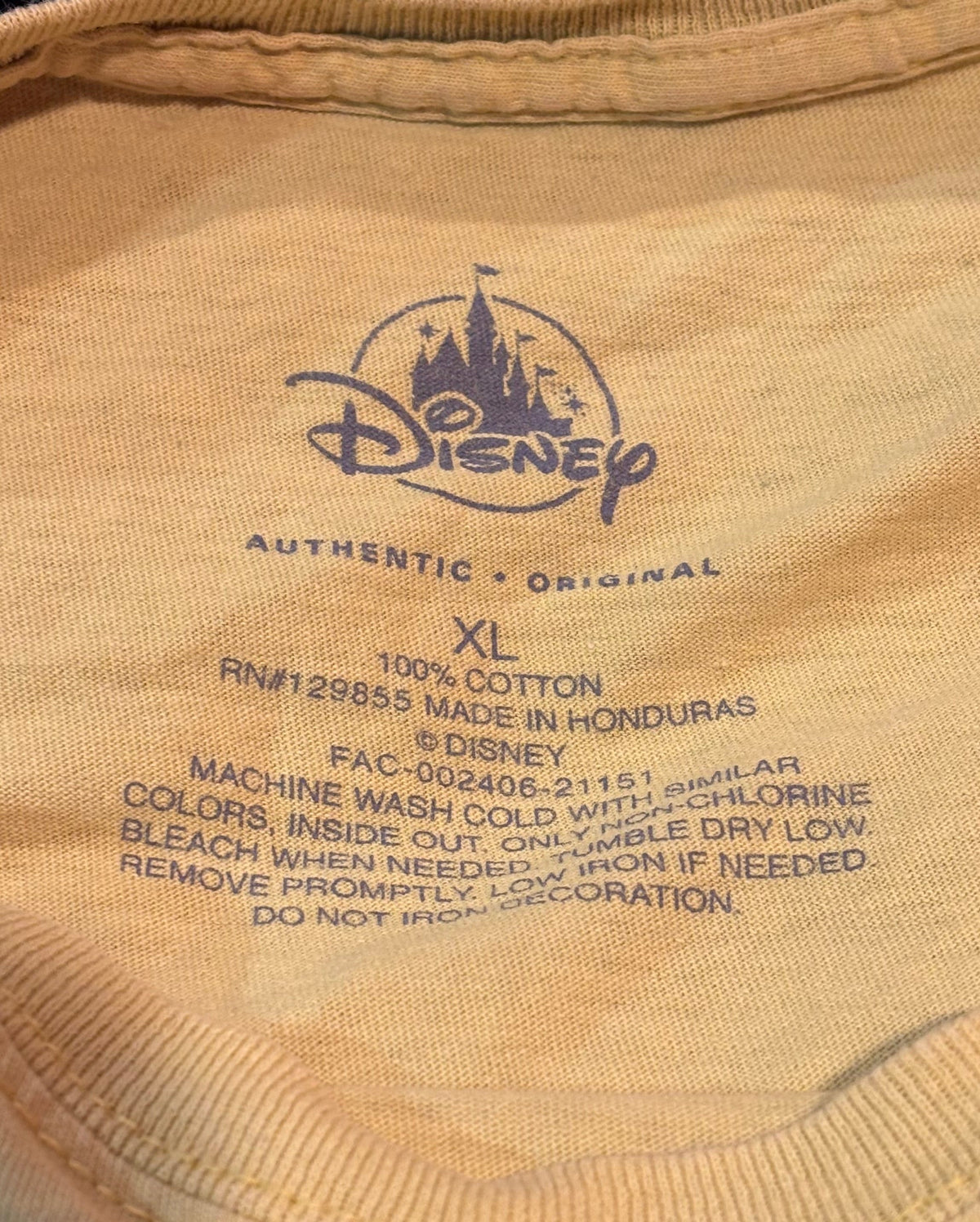 Yellow Disney Donald Duck Disneyland graphic T-shirt, front