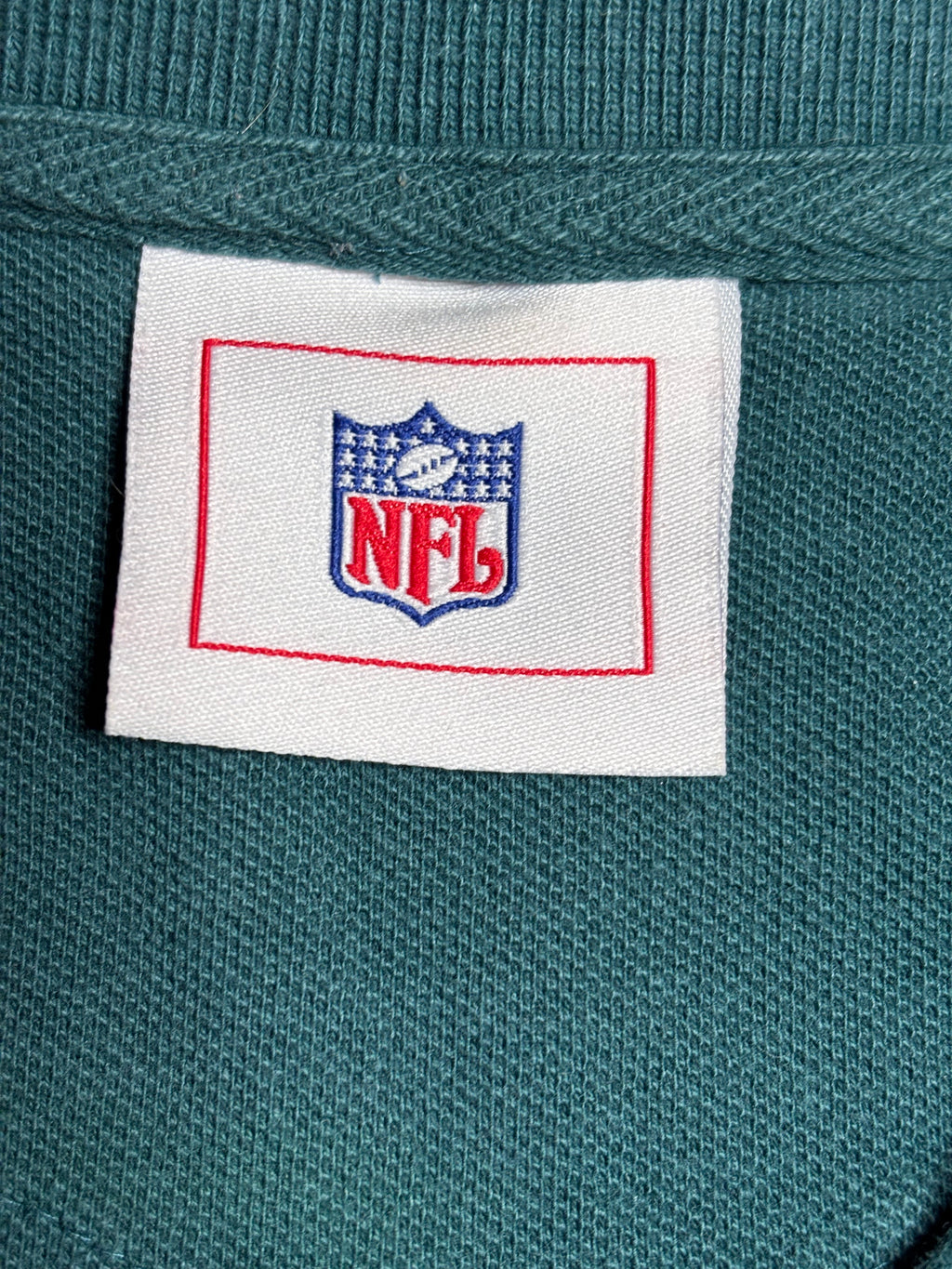 Philadelphia Eagles NFL green embroidered polo with striped collar and cuffs