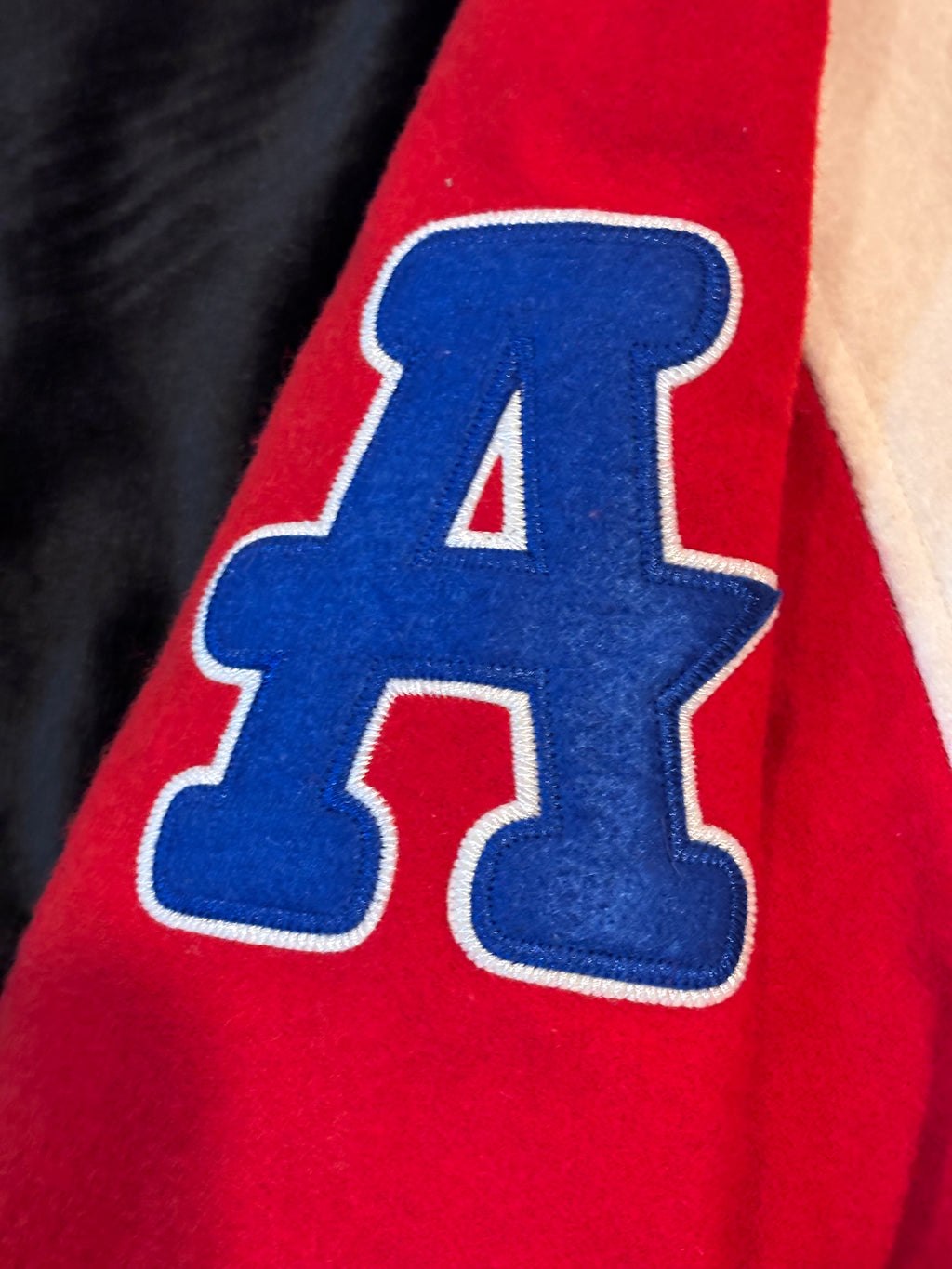 Left sleeve NLBM and Black Crackers patches