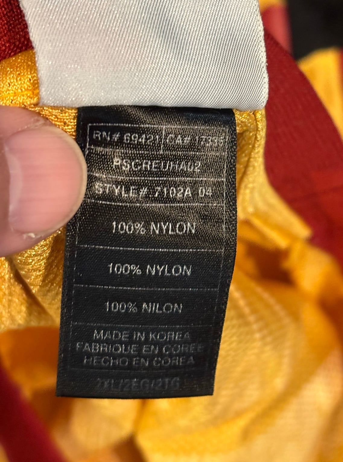 Care tag showing 100% nylon made in Korea RN 6921