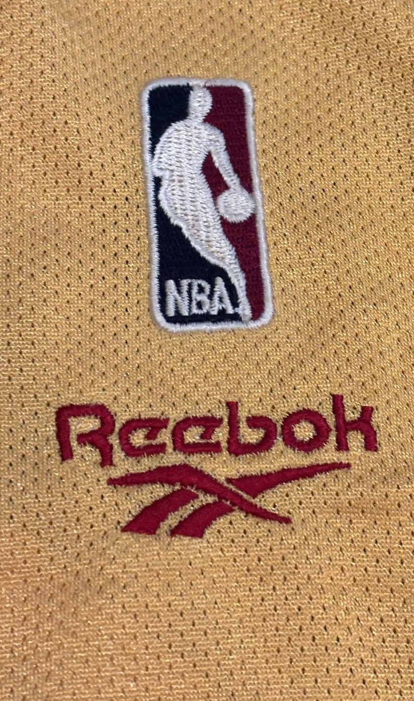 Embroidered NBA logo patch and Reebok wordmark