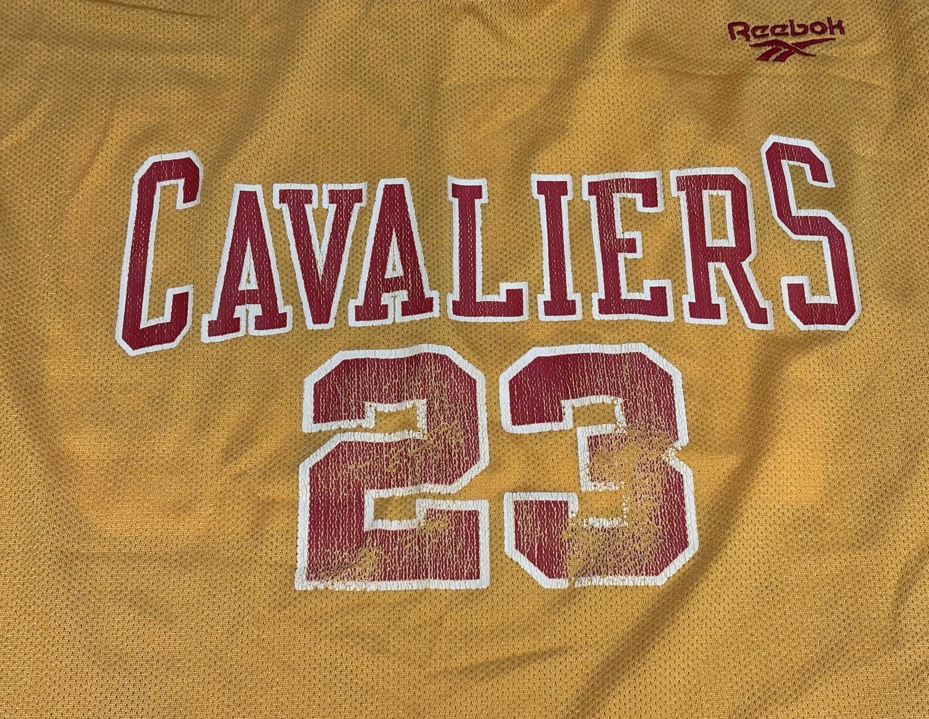 Close up of cracking and print loss on the number 23