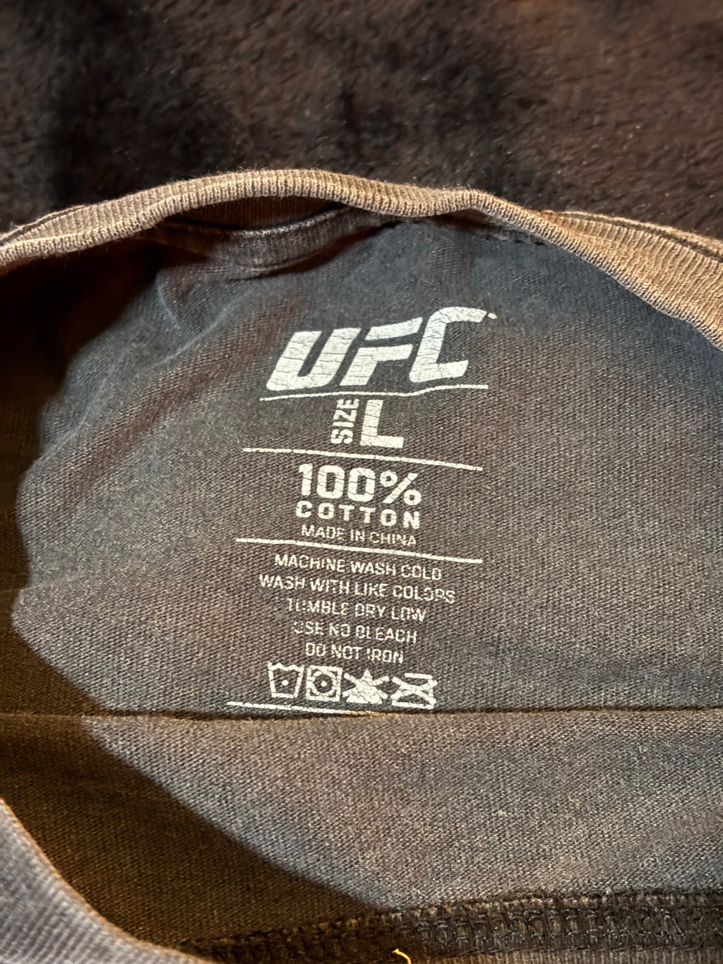 UFC size L tag inside collar