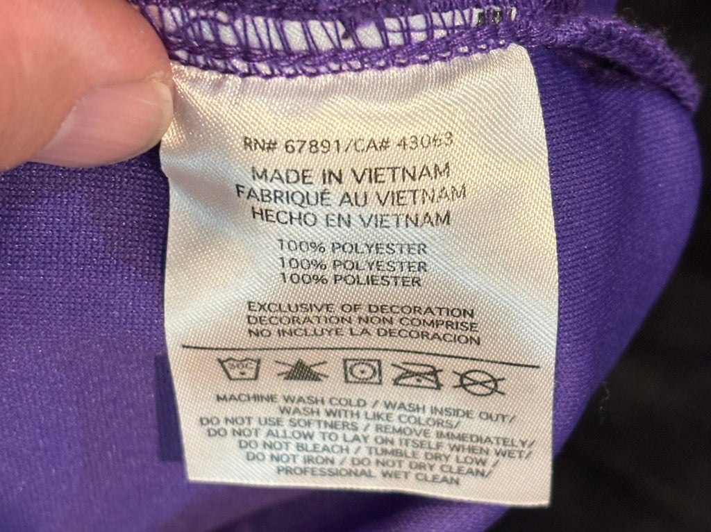 Care tag 100% polyester made in Vietnam RN 67891