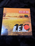 REM Reveal front