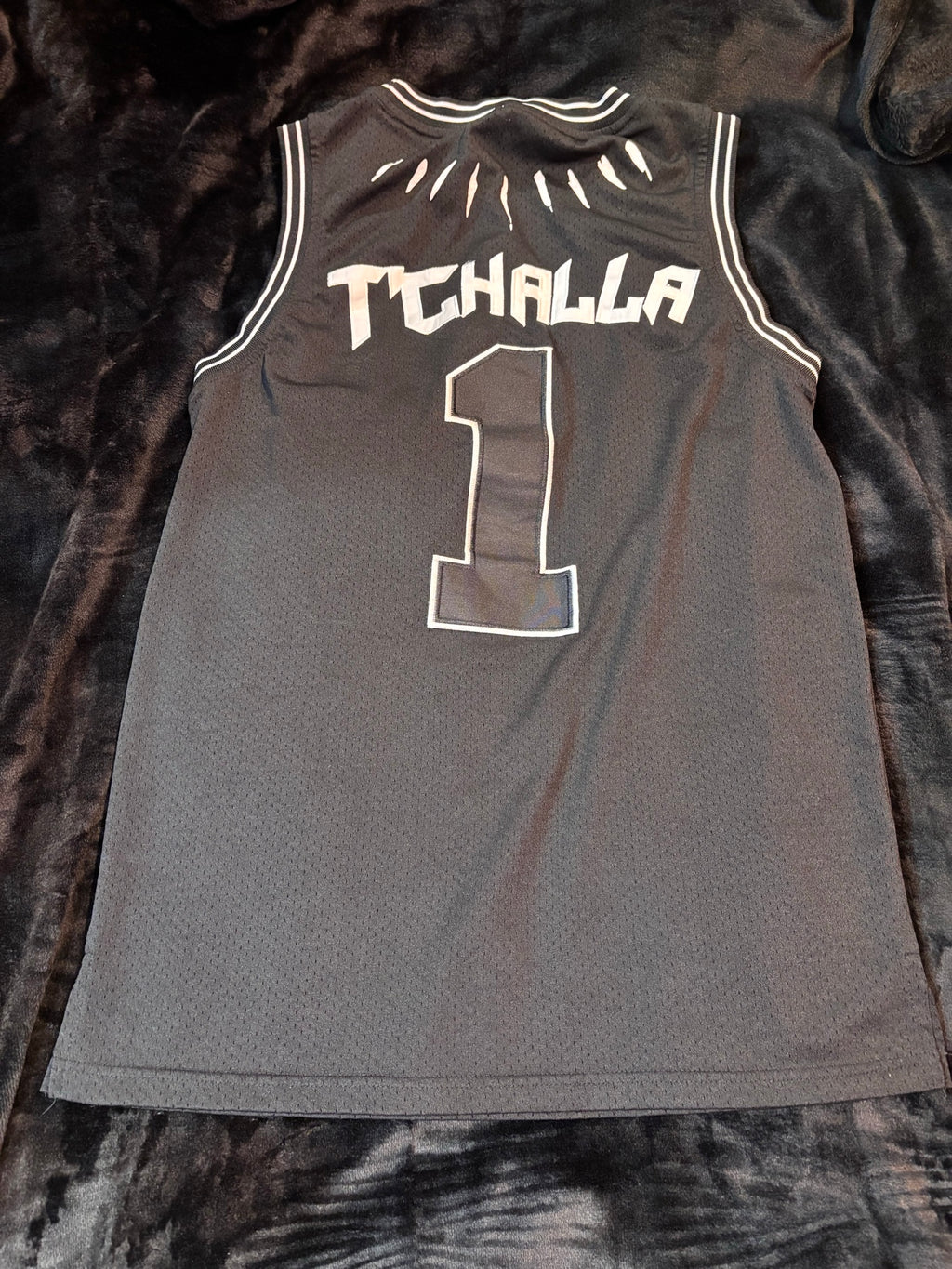 Back of jersey showing T'CHALLA name and number 1